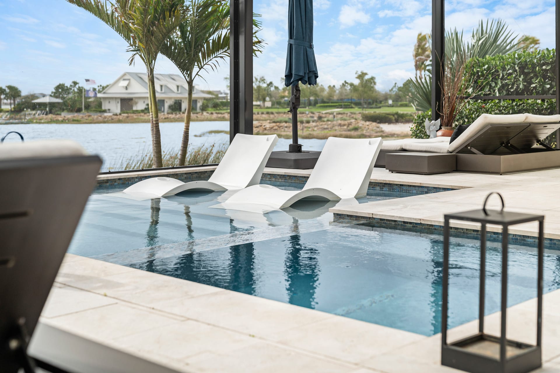 Custom pool design and construction on Casey Key, FL - Swim Inc. site-responsive design on narrow barrier island lot with Gulf views