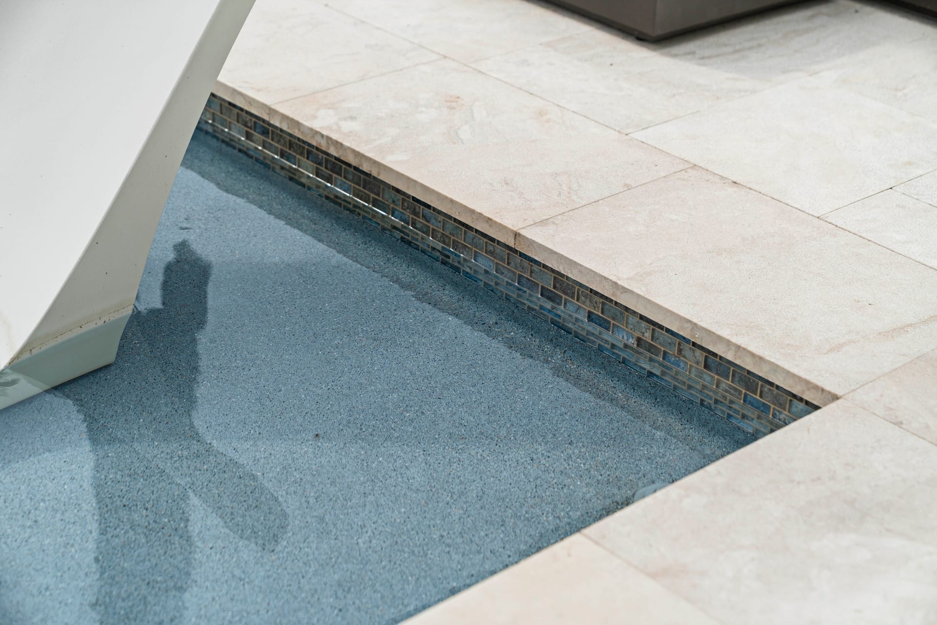 Custom pool design and construction on Longboat Key, FL - Swim Inc. vanishing edge pool with Gulf waterfront views