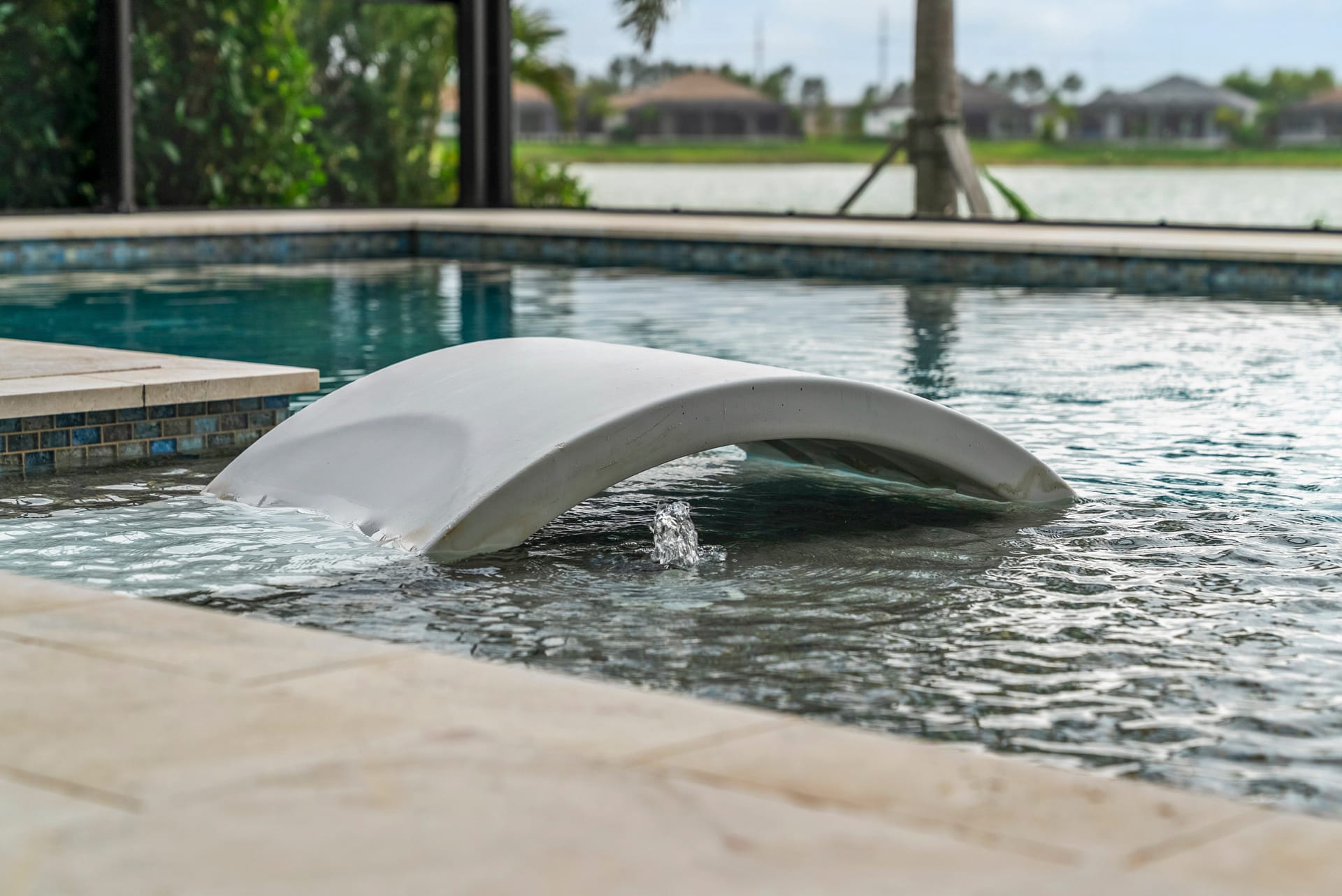 Sarasota resort style custom pool with swim-up bar